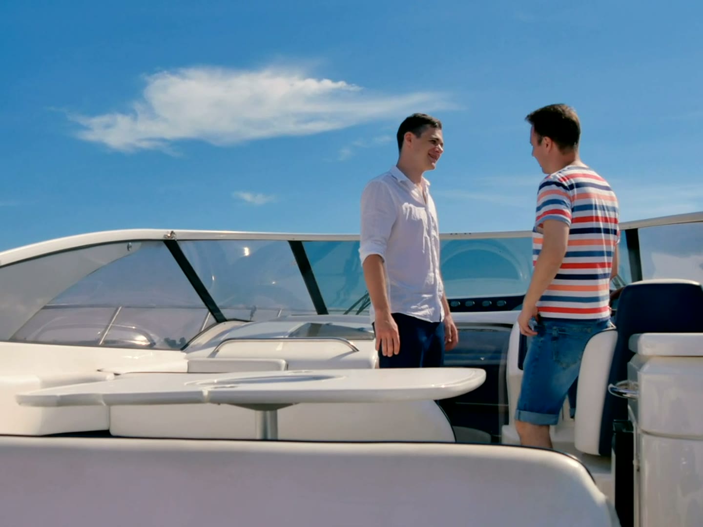 Crew member at work on deck aboard a private yacht
